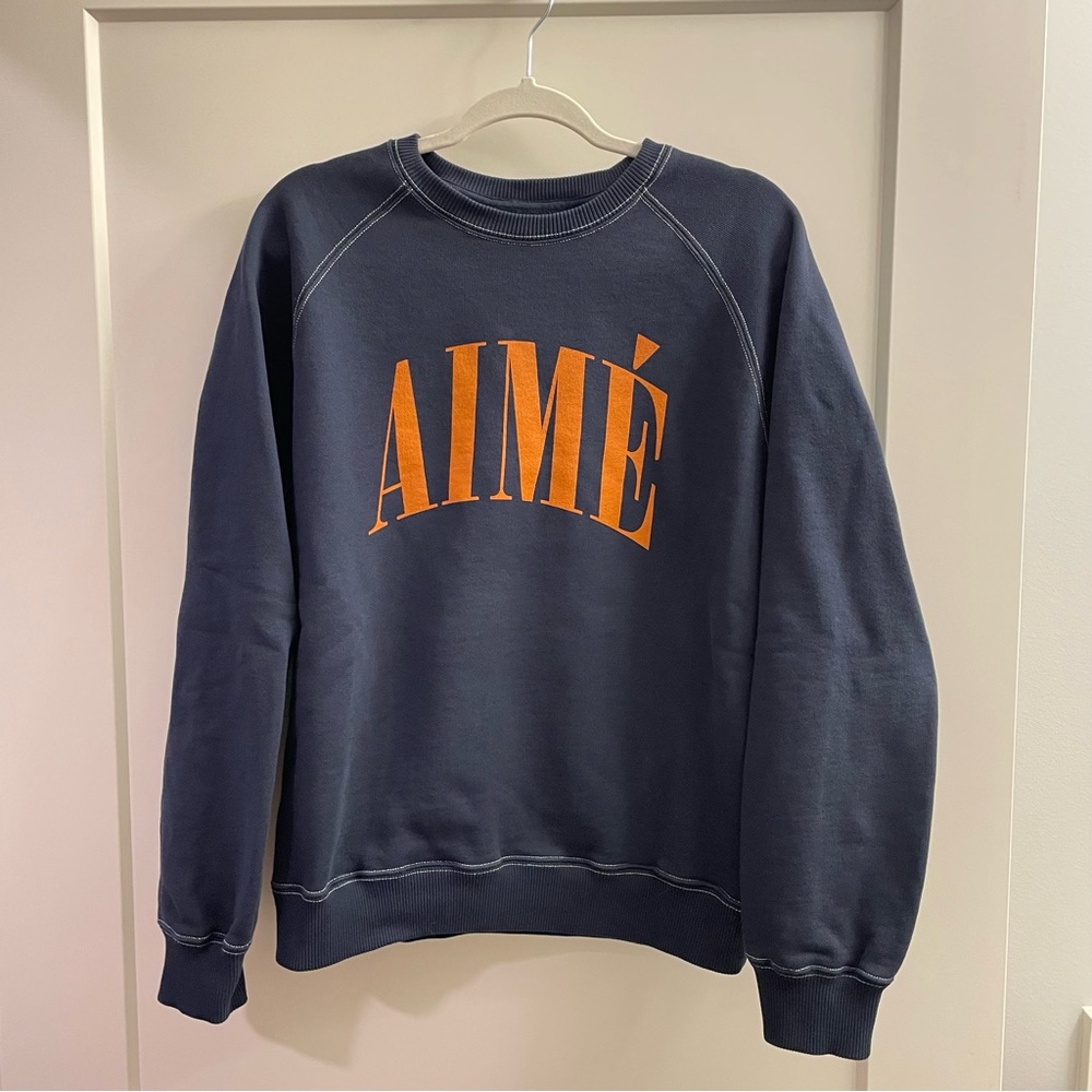Aime Leon Dore Dark Blue Sweatshirt with Vibrant Orange Lettering